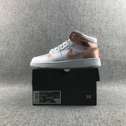 Side view of the sneaker above its box; the visible label shows Air Jordan 1 Low (GS), style code 555112 190, and sample size details including 5Y, EU 37.5, and CM 23.5.