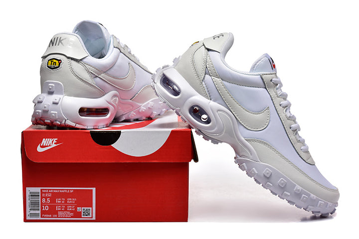 Nike Air Max Waffle SP sneakers displayed with a red Nike shoe box; the label shows a sample size.