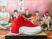 Side profile of a red and white high-top basketball sneaker with red laces.