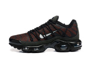 Side view of brown and black Nike Air Max Plus sneakers with a silver Swoosh and visible cushioning units.