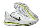 Nike Pegasus Premium shoes shown from the side and outsole, highlighting the tread and volt accents.