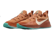 Warm orange Nike LeBron TR1 shoes with teal accents, product image