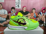 Side profile of a fluorescent green Nike sneaker showing the black Swoosh, illustrated side panel, white midsole, and green outsole.