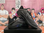 Pair of black basketball shoes showing metallic-look overlays, red details, and side emblems.