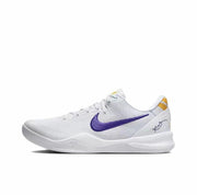 White Kobe 8 sneaker with a purple Swoosh and yellow heel accents.