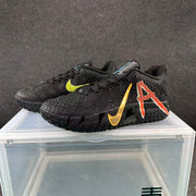 Pair of black basketball shoes with contrasting side graphics and Swoosh accents