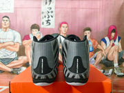 Rear view showing the gray heel panels and Nike Wrestling text.