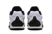 Rear view of the white, black, and gold basketball shoes