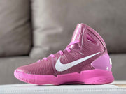Side profile showing the high-top silhouette, white Swoosh, and pink outsole.
