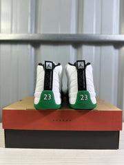 Rear view of the pair showing Jordan heel branding, green heel panels and the number 23.