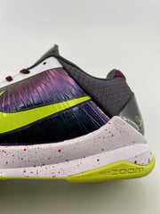 Rear-side detail of the textured dark heel and speckled midsole.