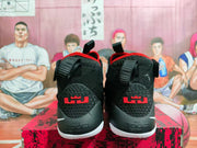 Rear view showing the shoes' red heel logos and visible Nike Zoom heel branding.