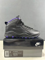 Side profile of the sneaker with the shoebox label visible, including Air Jordan, style code 130209 051, UK 6, EU 40, and CM 25.