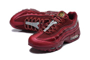 Burgundy Nike Air Max 95 TT sneakers shown from above and at an angled front view