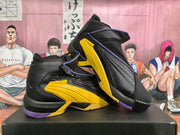 Three-quarter view of the black basketball sneakers with yellow side panels, purple accents and high-top collars.
