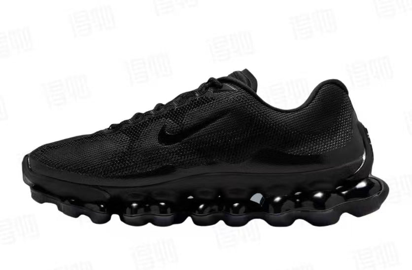 Side view of an all-black Nike running shoe with a textured upper and sculpted sole.