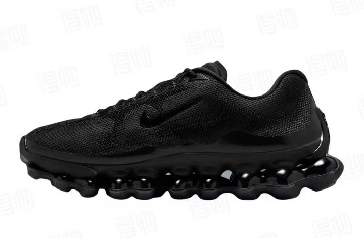 Side view of an all-black Nike running shoe with a textured upper and sculpted sole.