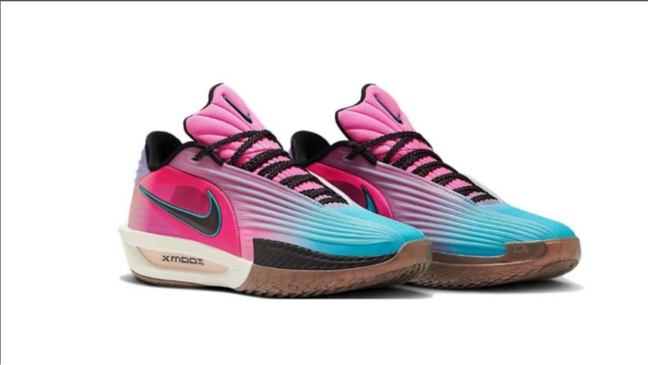 Nike G.T.3.5 basketball shoes in a blue, pink, black, and brown colorway, shown from a three-quarter angle.