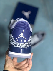 Heel view showing a Jumpman emblem, AIR lettering, and elephant-print overlay.