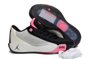 Black, pink and light gray Luka.77 sneaker shown with the outsole and visible Air Zoom branding.