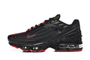 Side view of a black Nike Air Max Plus III sneaker with red accents and a visible heel cushioning unit.