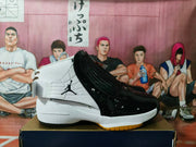 Side profile of the white and black high-top sneaker with visible Jumpman branding and layered upper panels.