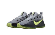 Pair of gray and lime-green Nike training shoes on a white background.