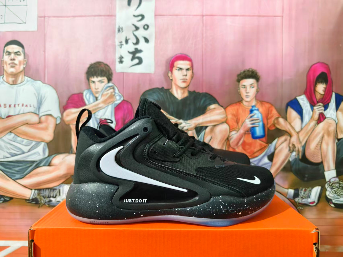 Side view of black Nike basketball shoes with white Swoosh logos and speckled midsoles.