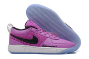 Purple low-top Nike Book 1 shoe with black Swoosh and pale blue outsole