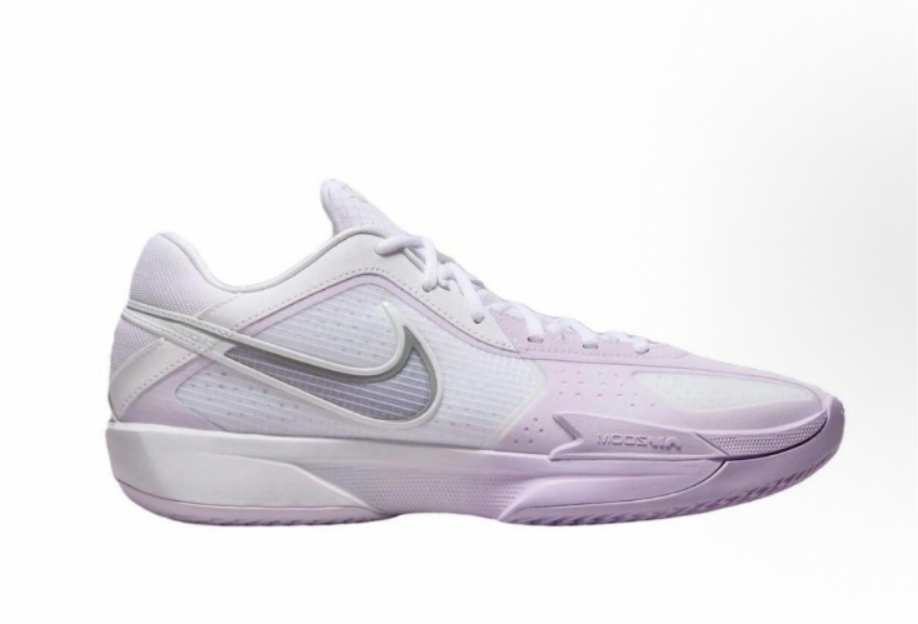 Side view of a white and pale purple Nike low-top sneaker with a contrasting Swoosh and textured outsole.