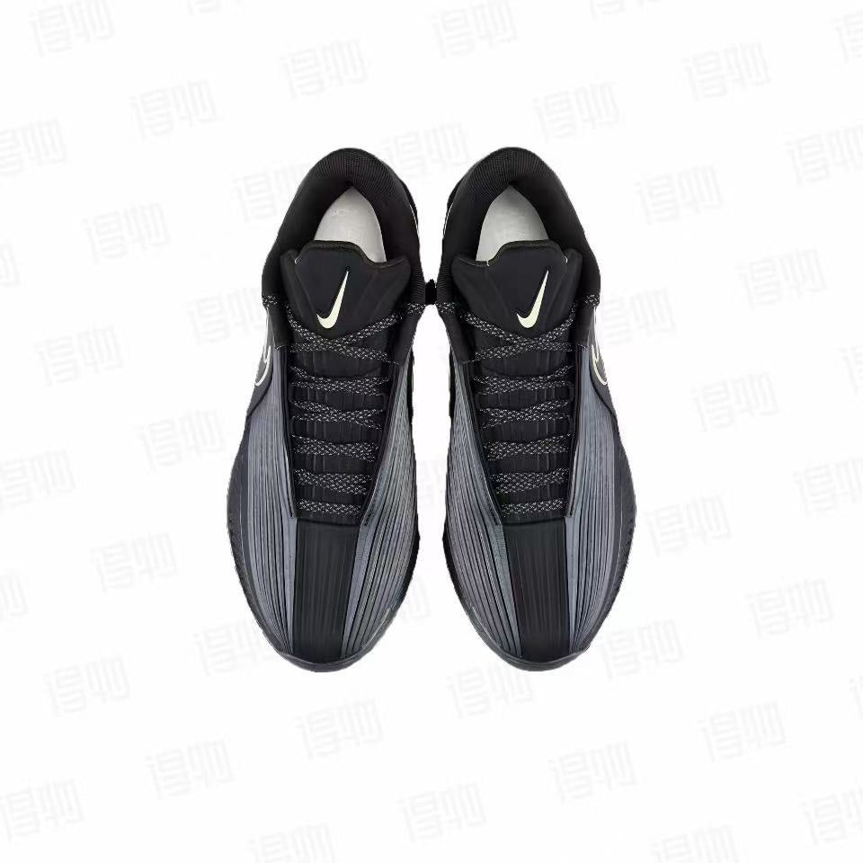 Top view of black Nike GT3 Turbo basketball shoes showing the lace-up design, padded tongues, and contrasting Swoosh details.