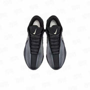 Top view of black Nike GT3 Turbo basketball shoes showing the lace-up design, padded tongues, and contrasting Swoosh details.