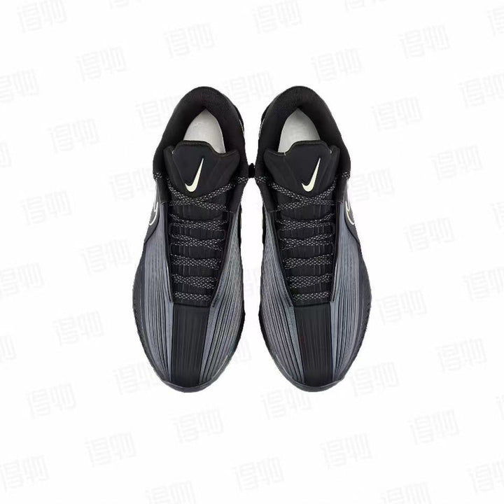 Top view of black Nike GT3 Turbo basketball shoes showing the lace-up design, padded tongues, and contrasting Swoosh details.