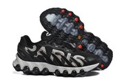 Nike Air Max DN 8 Paris sneakers shown from side and outsole views, highlighting the tread and red accents.