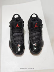 Pair of black and red Jordan 6 Rings-style high-top sneakers viewed from above, with size range text shown at the bottom.