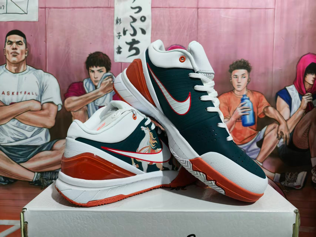 Pair of white, dark blue, and red Nike basketball sneakers displayed on a shoebox, showing the Swoosh, side illustration, and cushioned sole.