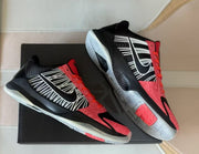 Angled view of the pair showing the sides and translucent-looking outsoles