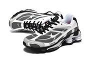 Angled view of Nike Shox Ride 2 sneakers showing the mesh upper, layered overlays, and sculpted sole.