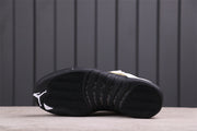 Outsole view showing the black tread of an Air Jordan 12 sneaker