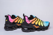 Pair of gradient Nike Air VaporMax Plus sneakers in side profile