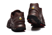 Rear view of brown Nike Air Max DN8 sneakers showing heel details and outsole.