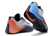 Rear and outsole views of the white, blue, and orange Nike S.T. Flare EP shoes.