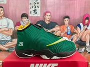Side profile of a green high-top Nike basketball sneaker showing the number 20, black midsole, white outsole, and yellow-trimmed Swoosh.