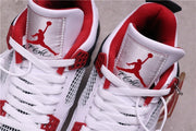 Close-up of the tongue labels with red Jumpman branding and black script detail.