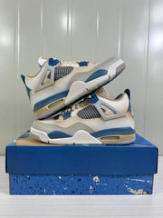 The two sneakers arranged one above the other to show their side profiles and blue accents.