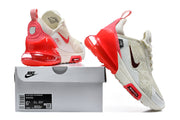 Nike Air Max 270 Premium sneaker beside its box, whose label shows a sample size