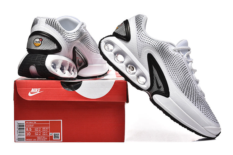 White and black Nike Air Max DN sneakers shown with a red box labeled Air Max DN and style code DV3337-103.