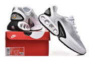 White and black Nike Air Max DN sneakers shown with a red box labeled Air Max DN and style code DV3337-103.