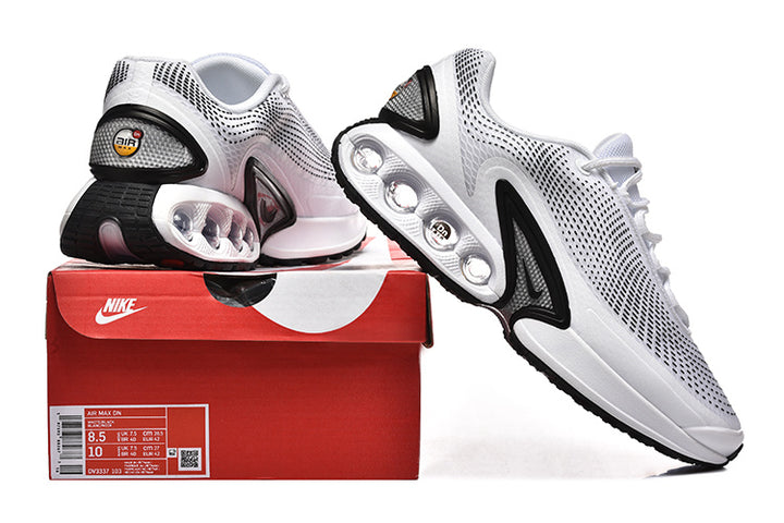 White and black Nike Air Max DN sneakers shown with a red box labeled Air Max DN and style code DV3337-103.
