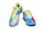 Pair of multicolor low-top basketball shoes with neon-yellow collars and laces, blue outsoles, and contrasting panels.